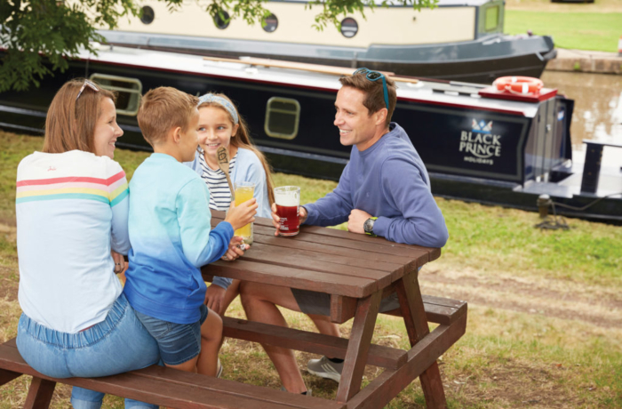 Black Prince Holidays - Family stopping for a drink in a beer garden on the canal